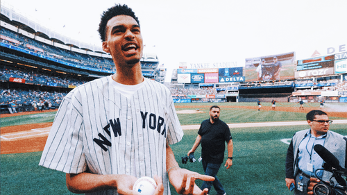 NBA trend picture: Victor Wembanyama throws the first pitch at Yankee Stadium before the NBA draft